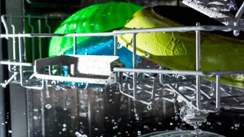 What should a dishwasher do to make sure a sanitizer will work well